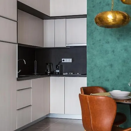 Apartamento Emerald Kissed Golden Gem